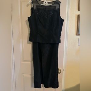 “MichaelAngelo” 2-piece formal gown with sequined and netted top. Size 12.